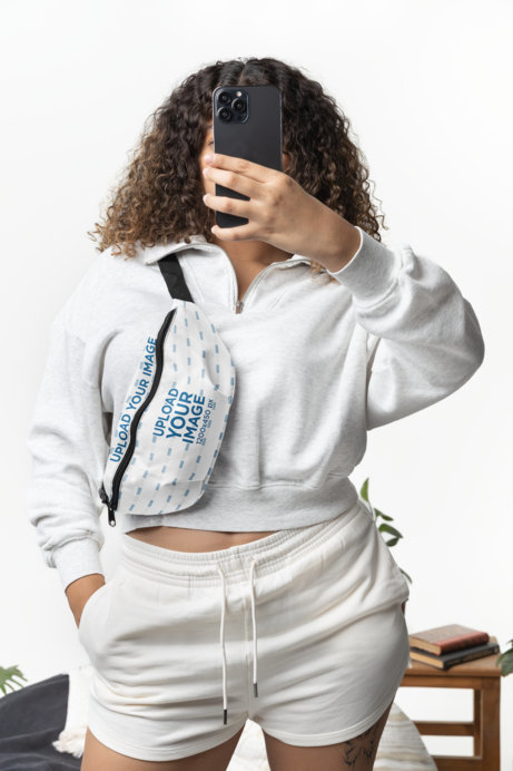 Mockup of a Woman Taking a Selfie While Carrying a Sublimated Fanny Pack