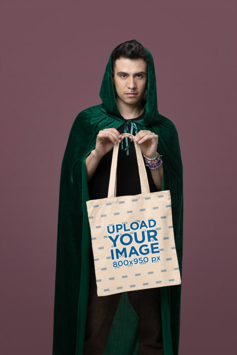Sublimated Tote Bag Mockup Featuring a Man Wearing a Swift Fandom-Inspired Costume