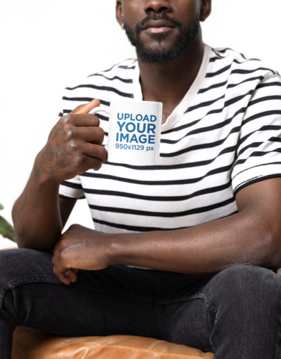 Mockup of a Cropped-Face Bearded Man Holding a Sublimated Coffee Mug m40263