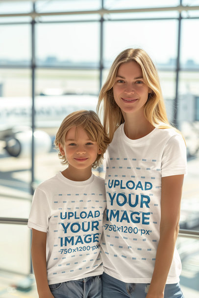AI-Created T-Shirt Mockup of a Mother and Her Son Standing in an Airport