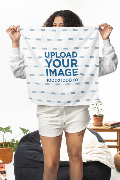 Mockup of a Curly-Haired Woman Hiding Part of Her Face With a Bandana m40310