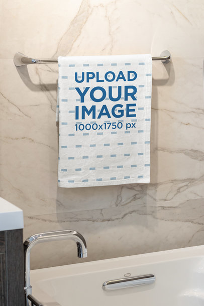 Mockup of a Hand Towel Placed on a Bathroom Steel Against a Marble Wall m40733