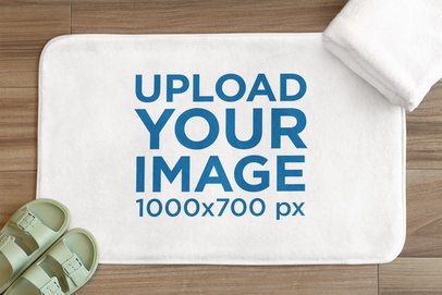 Mockup of a Bath Mat Lying on a Wooden Floor With a Towel and a Pair of Sandals m40716