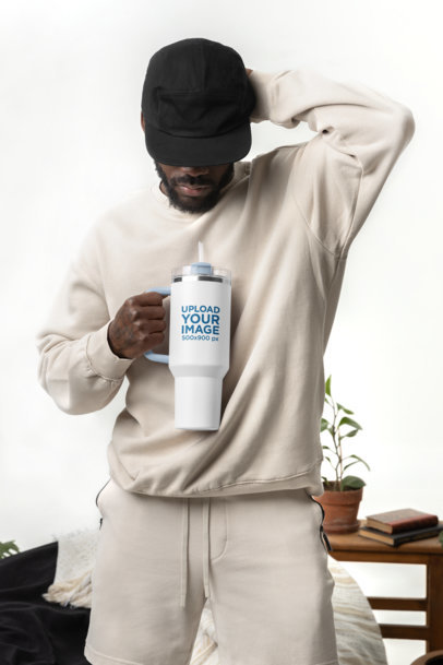 Mockup of a Bearded Man Holding a Sublimated Stanley Tumbler m40298