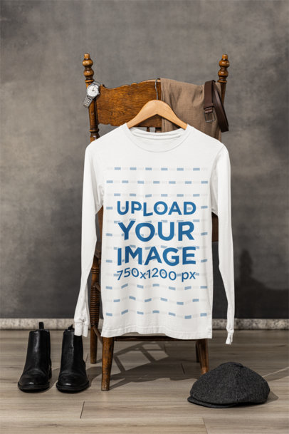 Mockup of a Bella Canvas Long-Sleeve Tee Hanging From a Vintage Chair With a Classy Outfit m39755