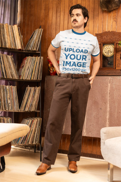 Ringer T-Shirt Mockup Featuring a Man Posing in a Retro Room with a Grandpacore Outfit m40648