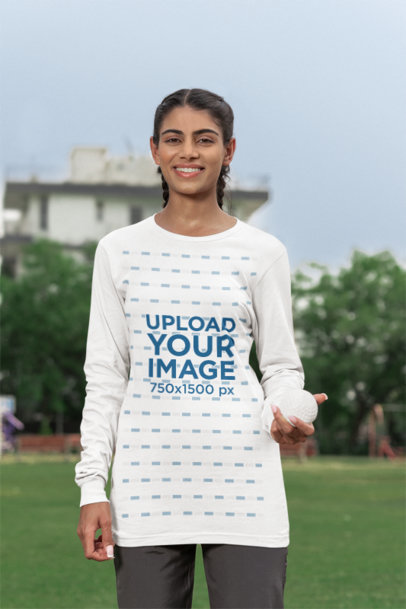 Bella Canvas Long Sleeve Tee Mockup of a Smiling Woman Holding a Cricket Ball  m40008