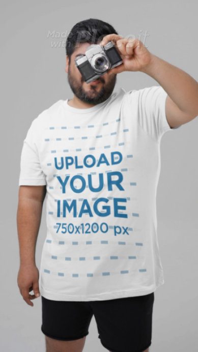 Bella Canvas T-Shirt Video Featuring a Man Covering His Face With a Vintage Camera