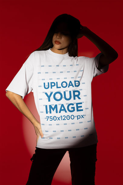 Round-Neck Tee Mockup Featuring a Woman Posing in a Studio with a Spotlight m50037