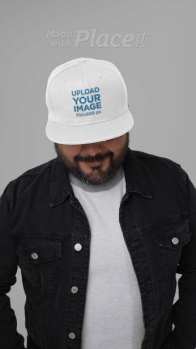 Snapback Hat Video of a Smiling Bearded Man in a Studio