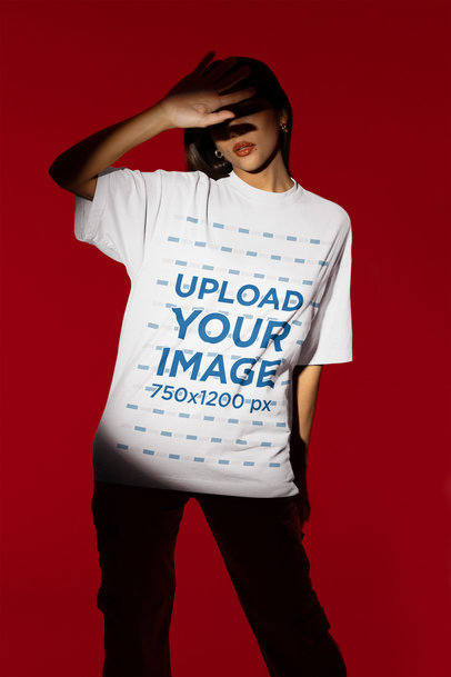 Crewneck T-Shirt Mockup Featuring a Woman Standing in the Spotlight of a Studio m50038