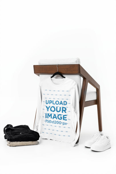 Bella Canvas Long-Sleeve Tee Mockup Featuring a Modern Chair With Two Pants and a Pair of Sneakers m39757