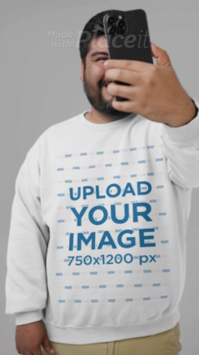 Gildan Sweatshirt Video Featuring a Happy Man Taking a Selfie in a Studio