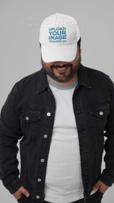 Embroidered Dad Hat Video Featuring a Happy Bearded Man in a Studio