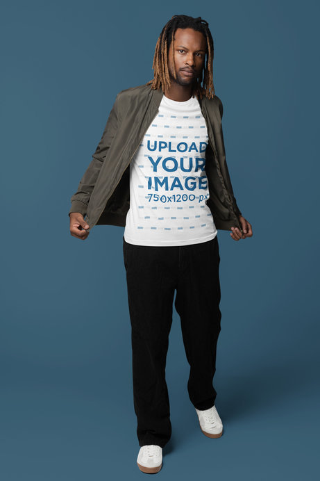Mockup of a Man Wearing a Round-Neck Bella Canvas Tee Under a Bomber Jacket