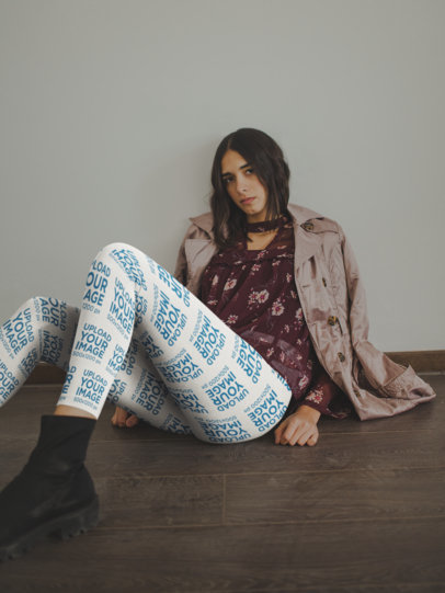 Women's Leggings Mockup of a Fashionable Woman Lying on the Floor Against a Wall