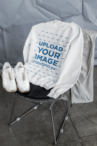 Streetwear Mockup of a Gildan Crewneck Sweatshirt Placed on a Chair m39777