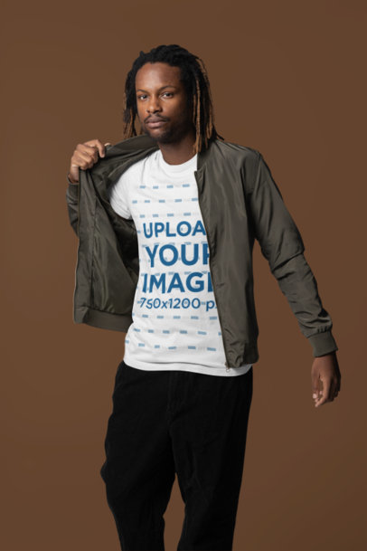 Mockup of a Man Wearing a Crewneck Bella Canvas T-Shirt Under a Bomber Jacket m40844