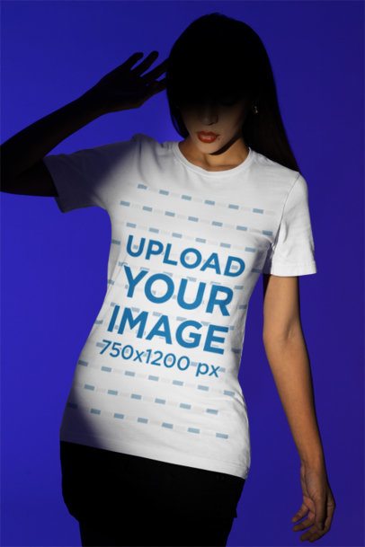 Bella Canvas Tee Mockup of a Woman With a Spotlight Pointing at Her