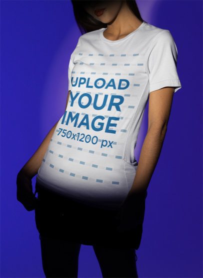 Bella Canvas Tee Mockup Featuring a Serious Woman Under a Spotlight Setting