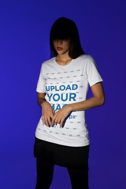 Spotlight-Themed Mockup of a Serious Woman in a Bella Canvas Round-Neck T-Shirt