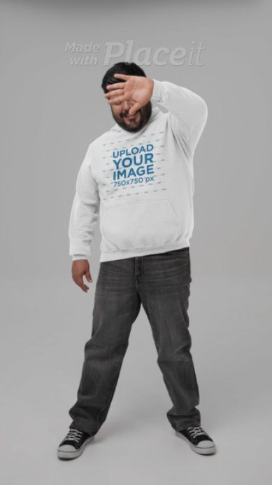 Gildan Video of a Bearded Man Wearing a Hoodie and Covering His Face