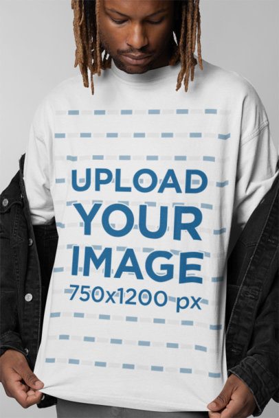 Closeup Mockup of a Man Wearing a Rounded-Neck T-Shirt in a Studio