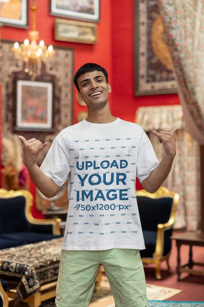Blinkstore T-Shirt Mockup of a Happy Gen-Z Man Making Shaka Hand Sings m40994