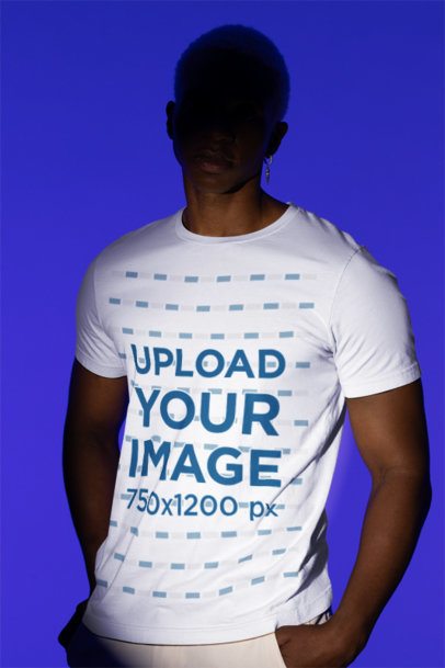 Bella Canvas T-Shirt Mockup Featuring a Man with a Shadowed Face in a Studio