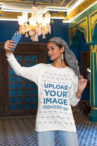 Bella Canvas Long Sleeve Tee Mockup of a Woman Taking a Selfie in a Room