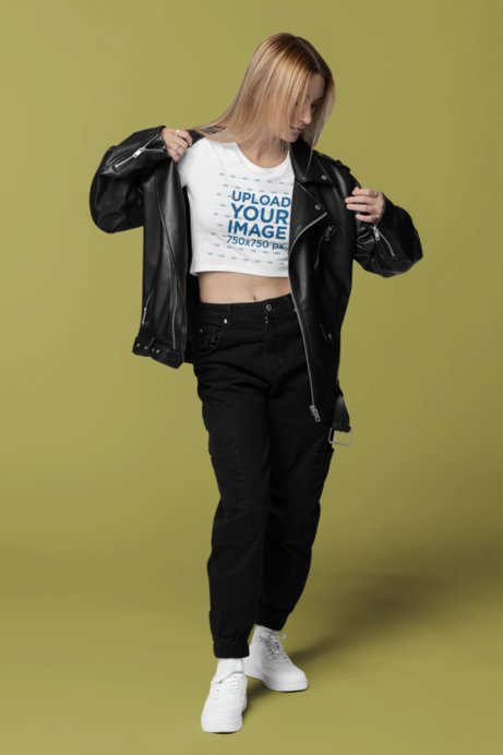 Mockup of a Woman Wearing a Bella Canvas Crop Top Under a Leather Overshirt