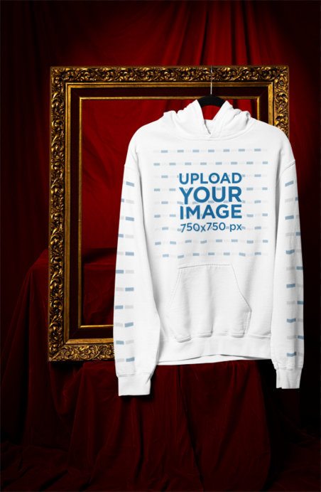 Mockup of a Gildan Pullover Hoodie Hanging From a Decorative Frame