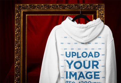 Back-View Mockup of a Gildan Pullover Hopdoe Hanging from a Golden Frame m41076