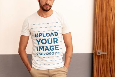 Bella Canvas T-Shirt Mockup Featuring a Cropped-Face Bearded Man With Tattoos