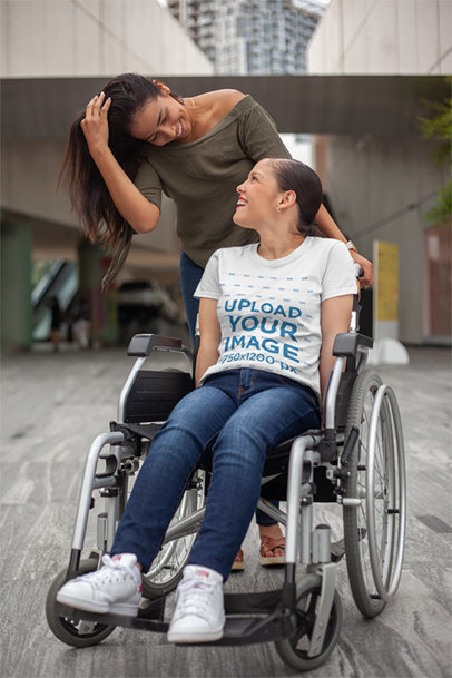 Mockup of a Woman Using a Wheelchair while Wearing a Tshirt with her Friend