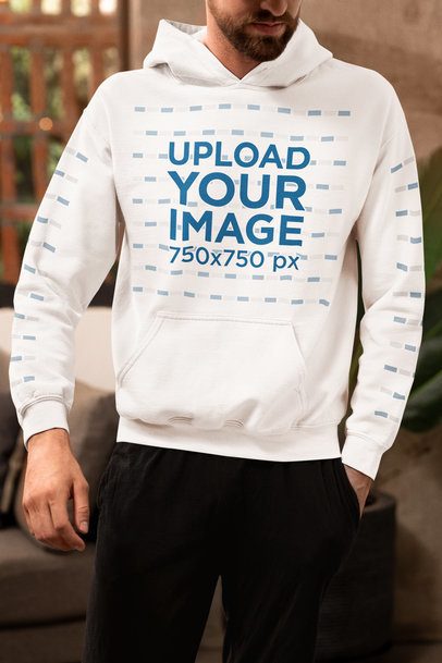 Mockup of a Bearded Man Wearing a Gildan Hoodie with Customizable Sleeves