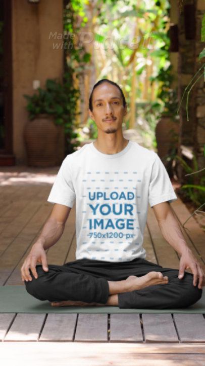 Video of a Yoga Instructor Meditating in a Bella Canvas Round-Neck Tee