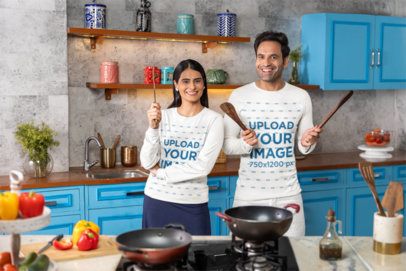 Bella Canvas Long-Sleeve Tee Mockup Featuring a Cheerful Couple Getting Ready to Cook
