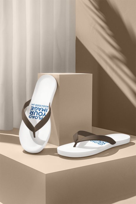 Mockup of an AI-Created Pair of Flip Flops Placed on Colorful Cubes