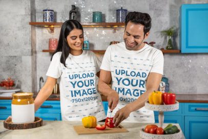 Scott International Tee Mockup of a Happy Man and Woman Chopping Off Peppers