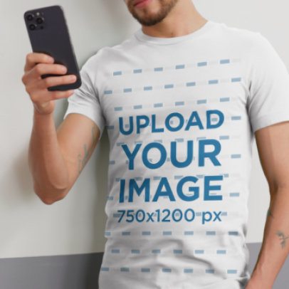 Bella Canvas T-Shirt Video Featuring a Man Using a Smartphone