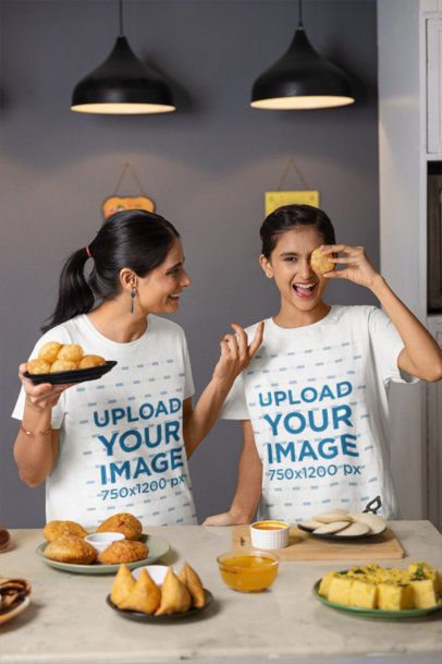 Scott International T-Shirt Mockup of a Happy Woman Having Fun in the Kitchen With Her Daughter m41156