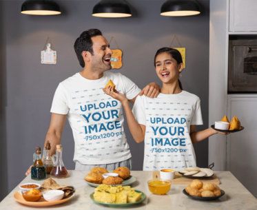 Scott International T-Shirt Mockup Featuring a Cheerful Man Cooking Snacks With Her Daughter m41158