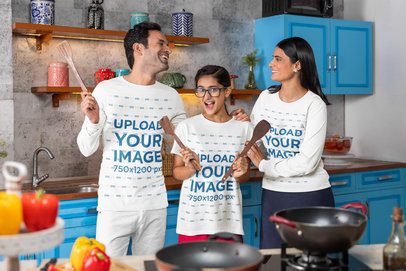 Scott International Tee and Bella Canvas Long-Sleeve Tee Mockup of a Smiling Family Having Fun in a Kitchen m41128