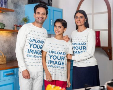 Bella Canvas and Scott International Mockup of a Smiling Family Wearing Long-Sleeve Tees and a T-Shirt in a Kitchen