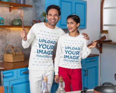 Bella Canvas Long-Sleeve T-Shirt Mockup of a Man and a Teenage Girl Posing With Cooking Tools