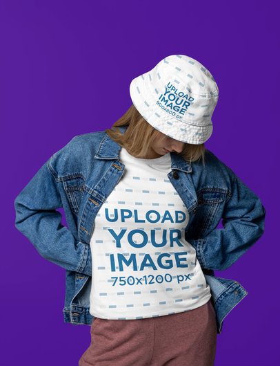Bella Canvas T-Shirt Mockup Featuring a Woman Wearing a Bucket Hat and a Denim Jacket