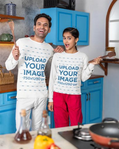 Bella Canvas Mockup Featuring a Man With His Teenage Daughter in Long-Sleeve Tees Posing in a Kitchen