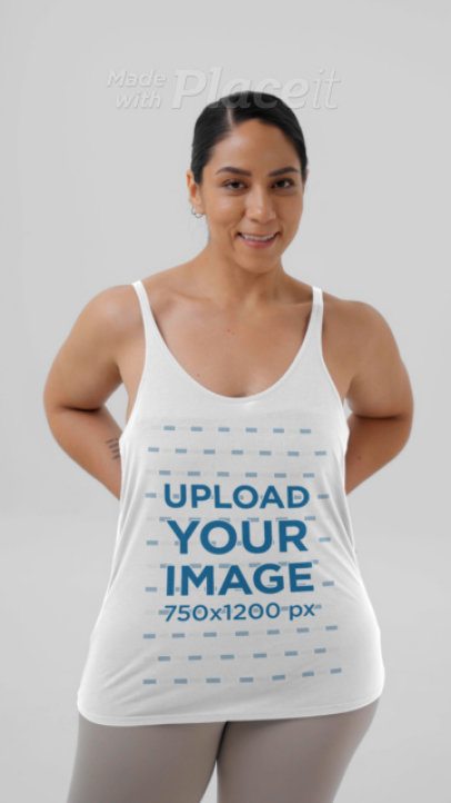 Tank Top Video of a Woman Stretching Her Leg in a Studio