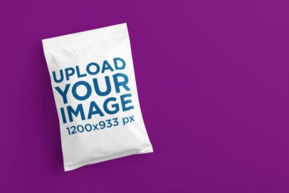 Print Mockup Featuring an AI-Created Chip Bag Lying on a Colorful Surface